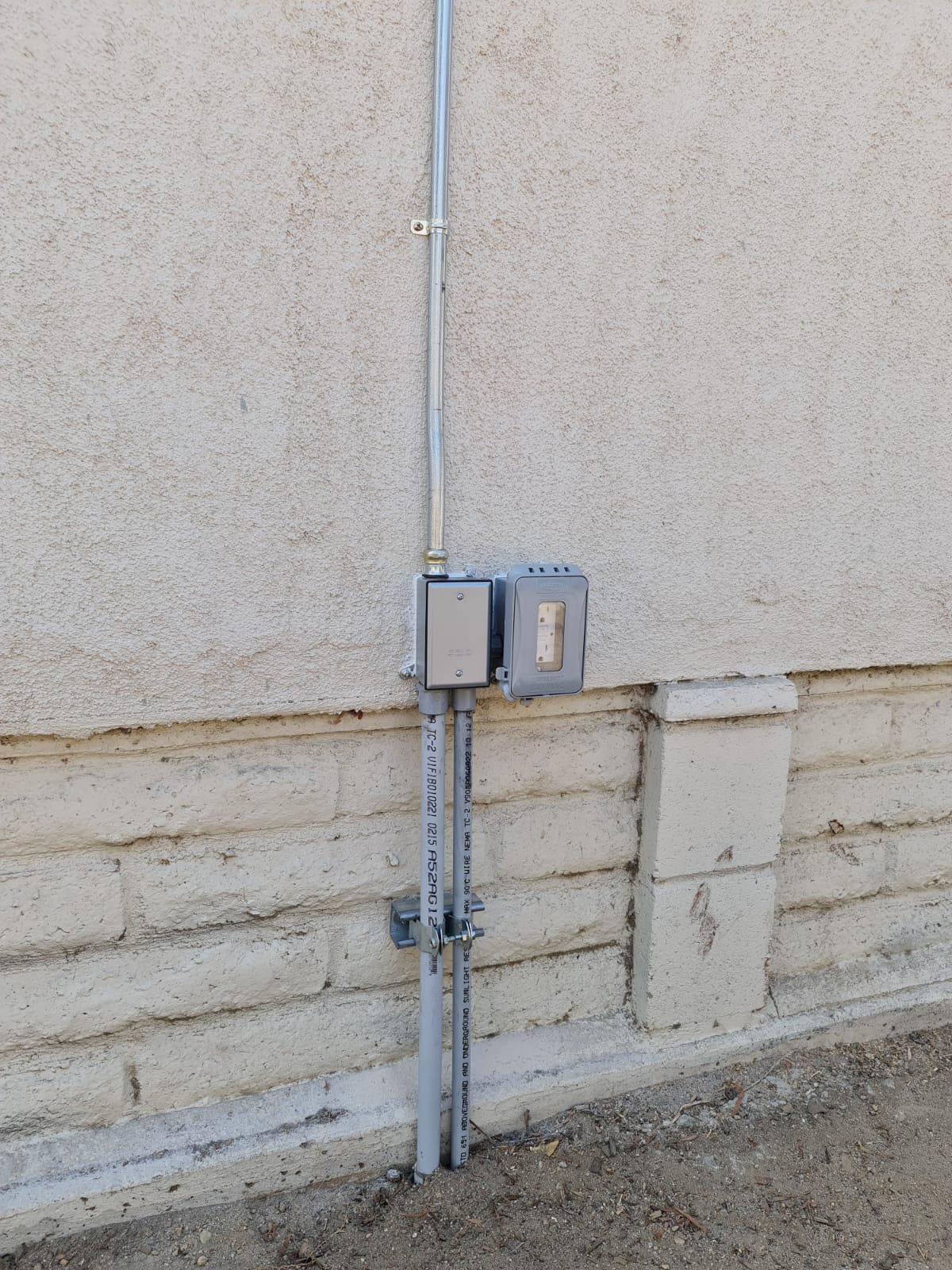 Outdoor Gfci Outlet With Conduit — INE Electrical Service job photo