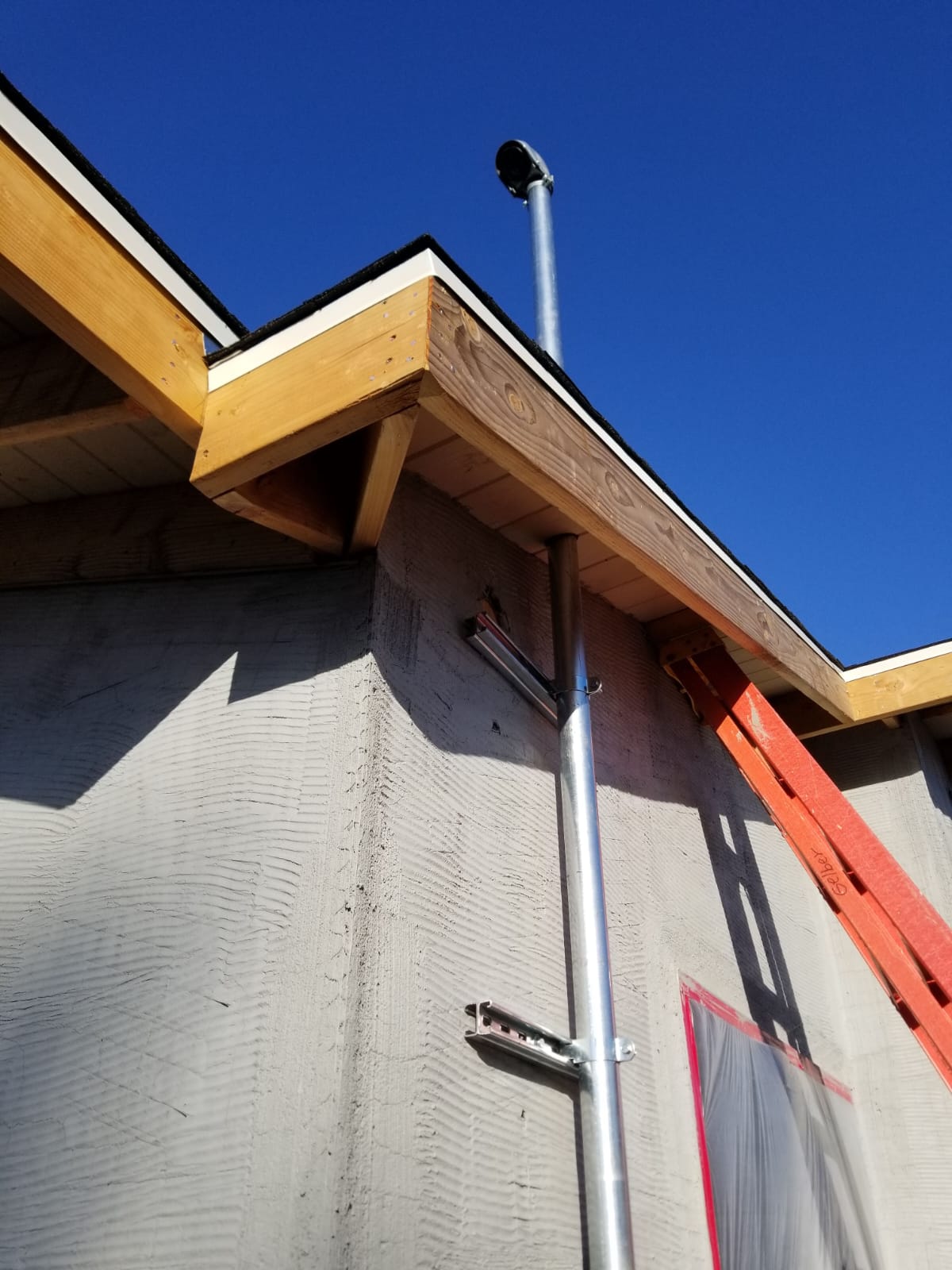 Service Entrance Mast On New Construction — INE Electrical Service job photo