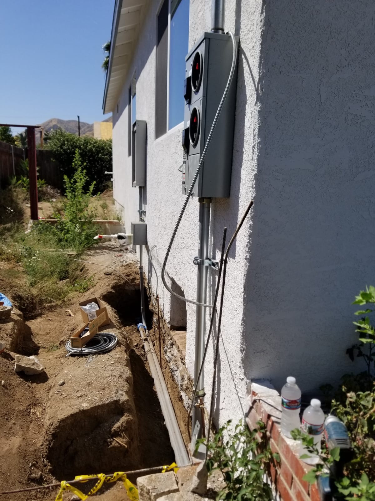 Two Meter Panel Upgrade With Trench — INE Electrical Service job photo